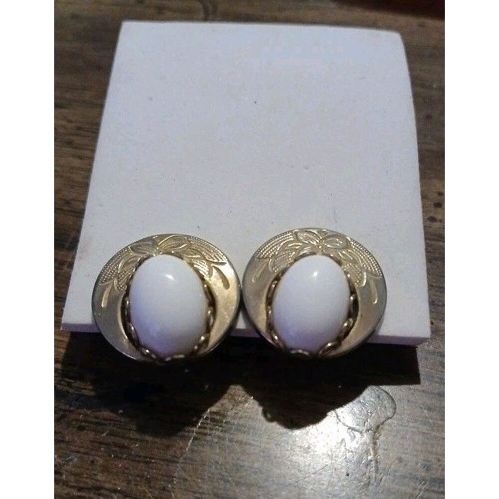 Vintage Clip On Earrings With Floral Gold Tone And Oval White Cabochons